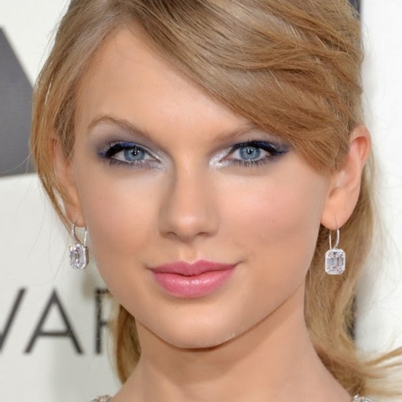 تايلور سويفت ترتدي أقراط الأحجار الكريمة من لورين شوارتز Lorraine Schwartz