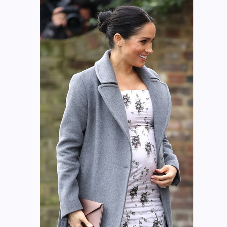 إعتمدت ماركل تسريحة الشعر المرفوع على شكل كعكة