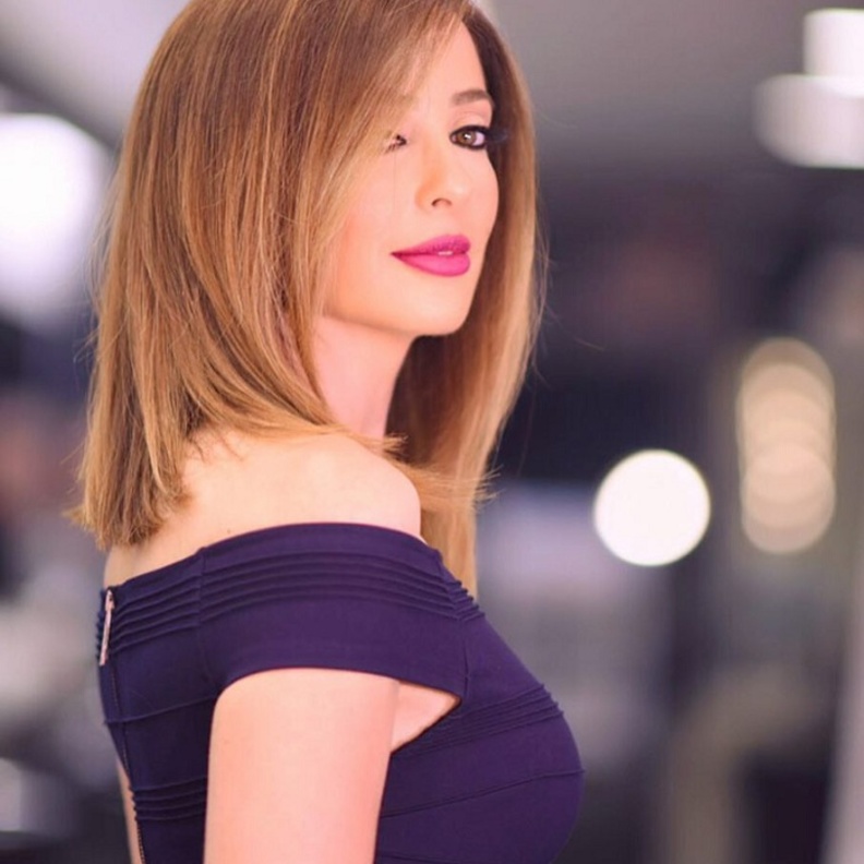 وفاء الكيلاني تكشف عن صورة ولديها