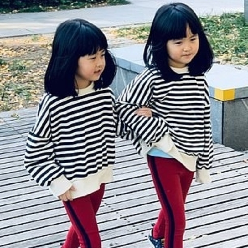 طفلتين صينيتين قد يتحقق حلمهما بمقابلة ملكة بريطانيا