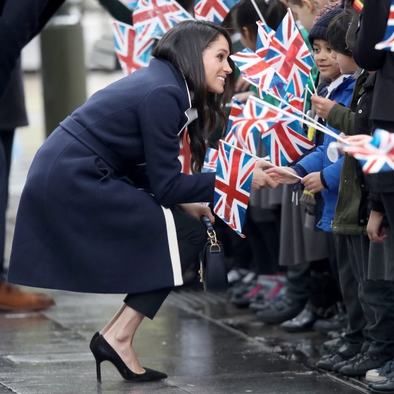 شوهدت ميغان في إحدى المناسبات وهي تصيح مشجعة مجموعة من الأطفال الصغار خلال مهمة رسمية