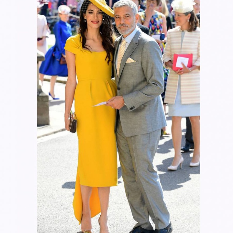 إطلالة أمل الاخيرة في قصر باكنغهام بفستان مستوحى من الأسلوب الإغريقي