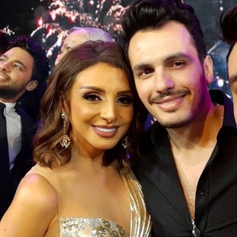 أنغام مع زوجها اثناء حفل توقيع البومها