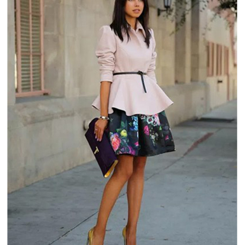 حقيبة يد باللون الذهبي من Christian Louboutin 