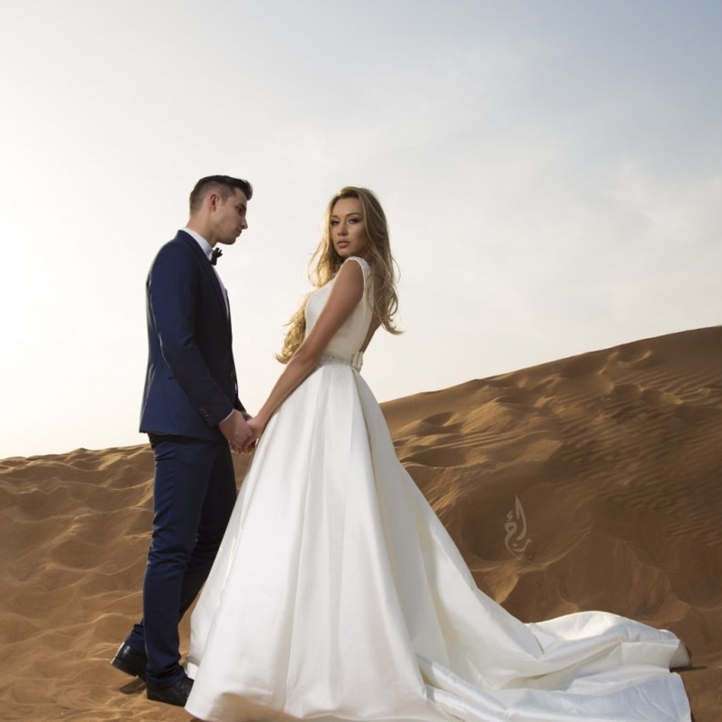 صورة عروسين بكاميرا المصورة السعودية رجاء عبدالله