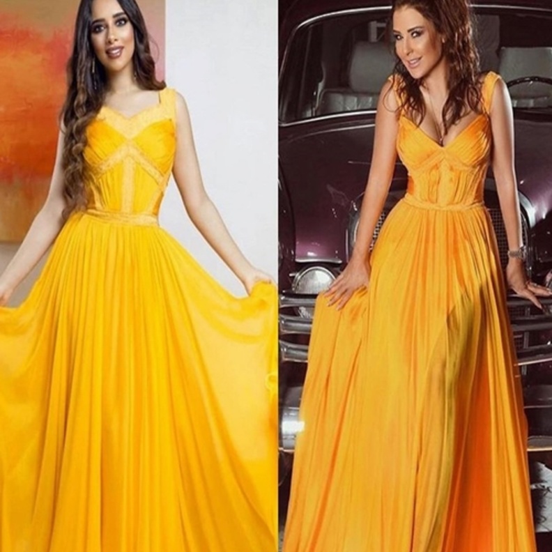 بلقيس بالفستان المرجاني من توقيع أنطوان قارح مع القماش الحريري