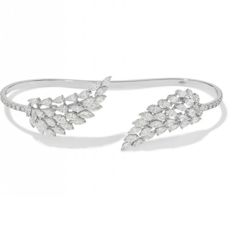 تصميم خاتم فاخر متوج بماسة صفراء قطع ماركيز من Boodles