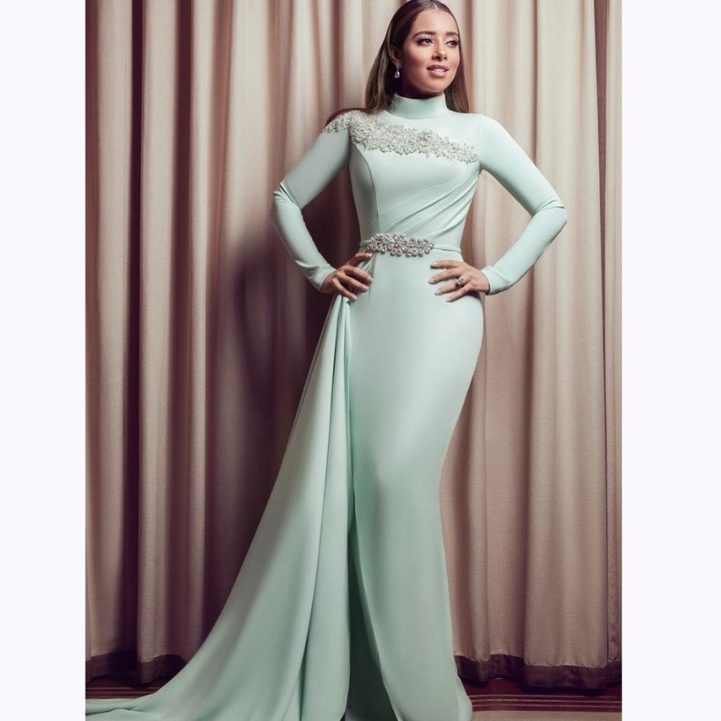 نوال الكويتية بإطلالة باللون الأخضر