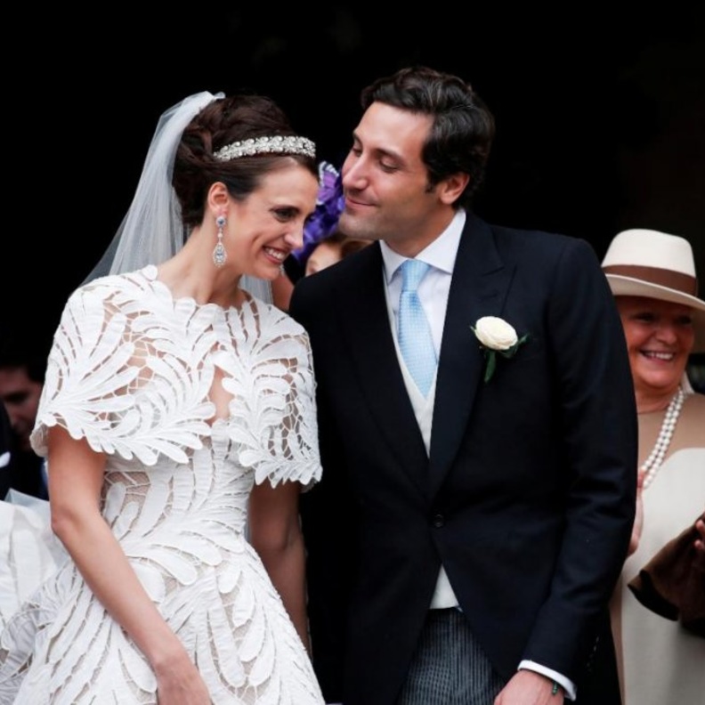  ابتسامة العروسين الملكيين