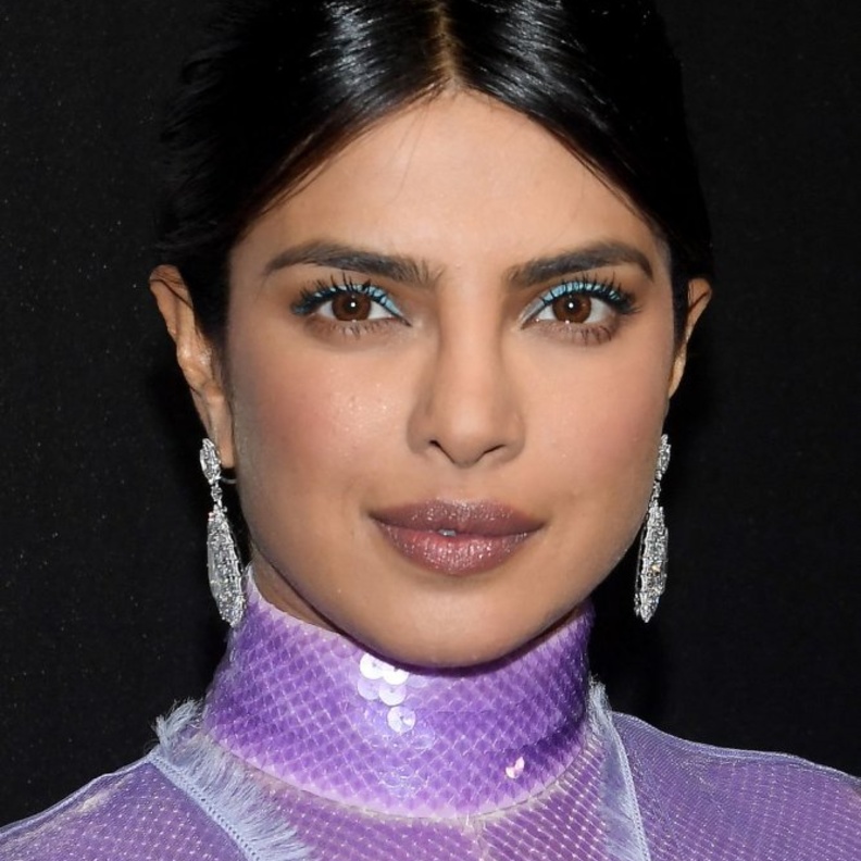 رسمات عيون ملونة وبنفسجية طبّقيها لشتاء 2020 من وحي Olivia Culpo