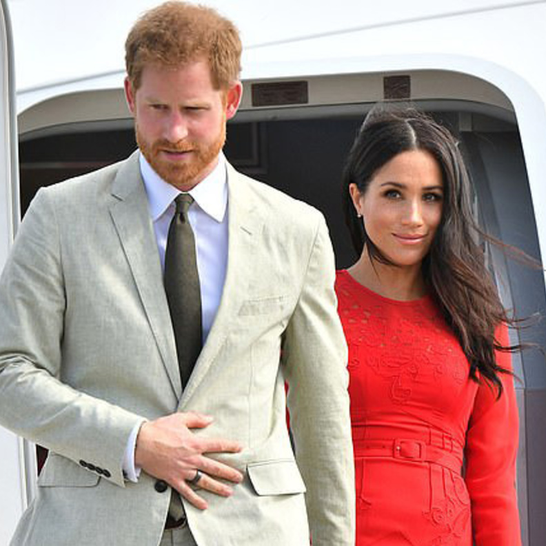 ملكة بريطانيا و الأمير هاري وميغان