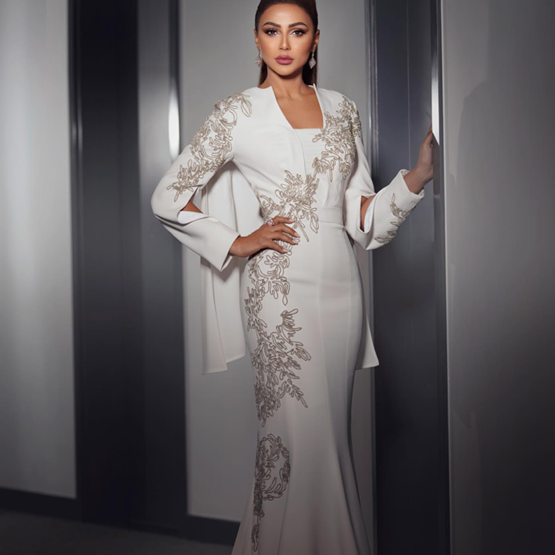 فساتين محتشمة باللون الأبيض لرمضان على طريقة مهيرة عبد العزيز من دار باسيل سودا