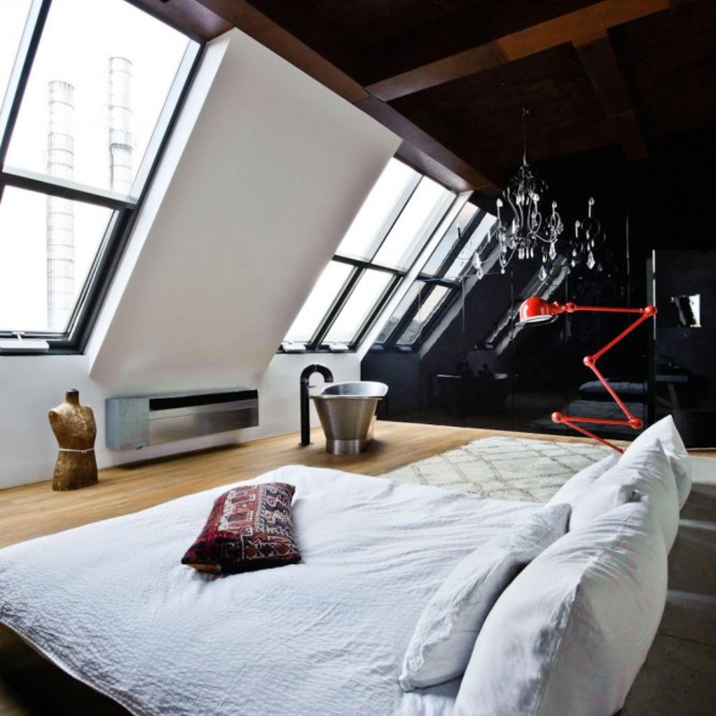 ديكور غرفة نوم مودرن تتميز بالجدران المائلة