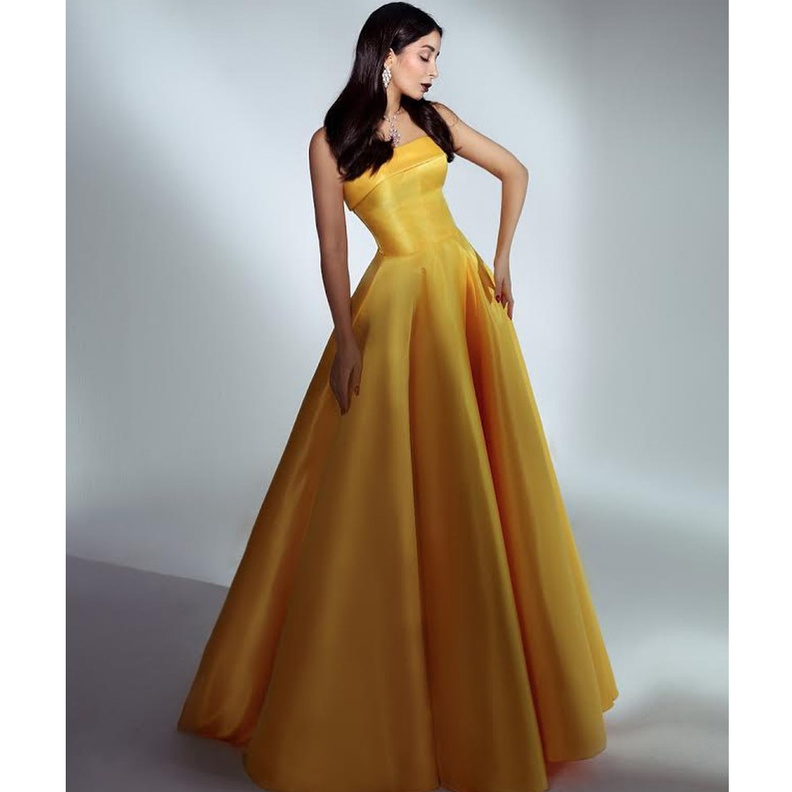 احدث موديلات فساتين ملونة موضة صيف 2020 مستوحاة من اطلالات اسيل عمران