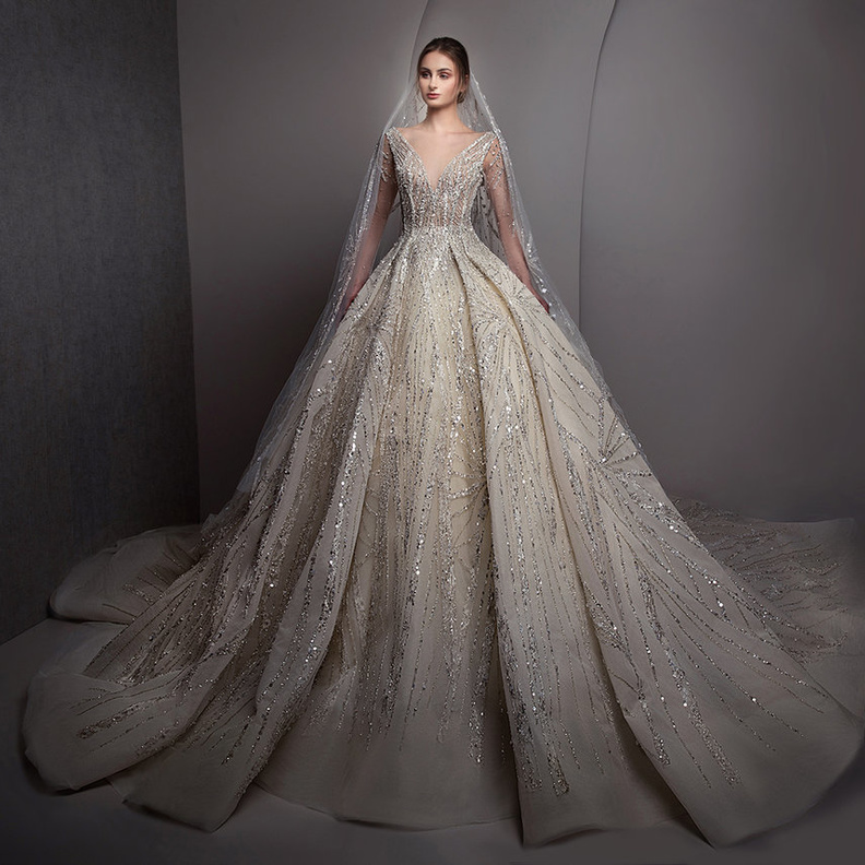 فساتين زفاف انيقة باكمام منسدلة من مجموعة زياد نكد