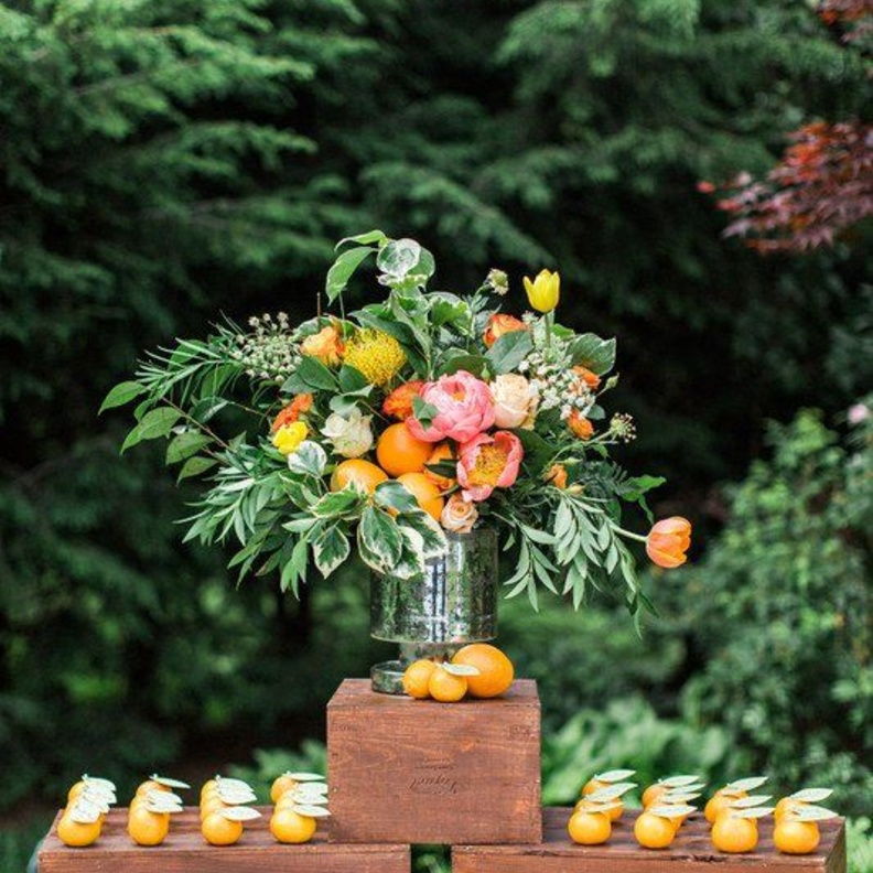 استخدمي ايضا الفواكه لطاولة ترقيم و توزيع الضيوف