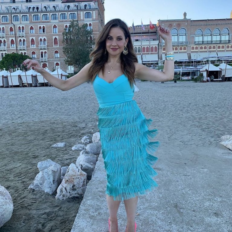 نسّقت مع اللوك حذاء باللون الفوشيا من Christian Louboutin