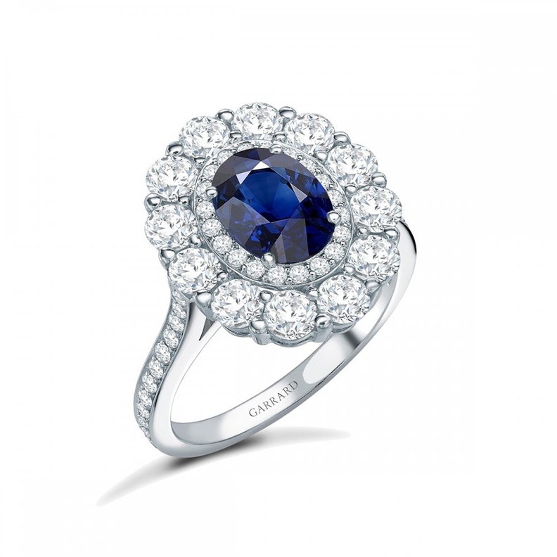 دبل خطوبة بحجر الياقوت الازرق من جيرارد Garrard