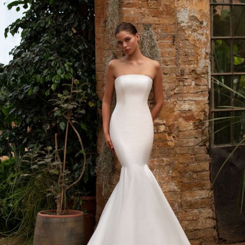 اختيار فستان الزفاف من زاك بوسن