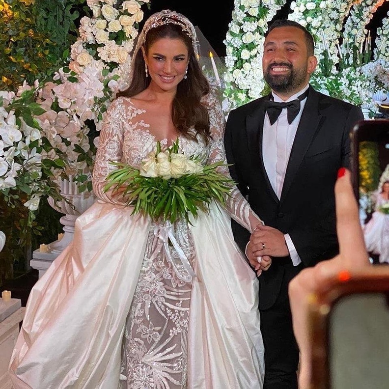 العروسان درة التونسية وهاني سعد