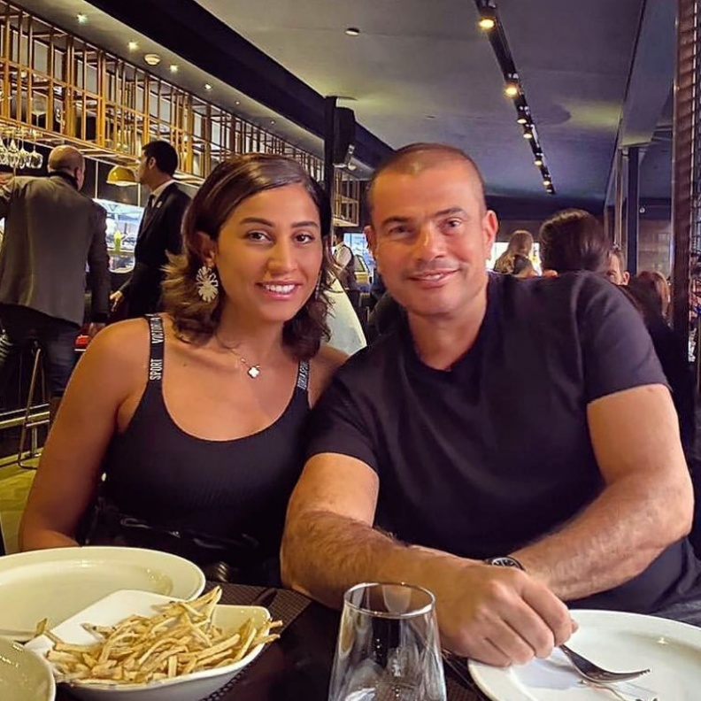 عمرو دياب ودينا الشربيني هل انفصلا عن بعض