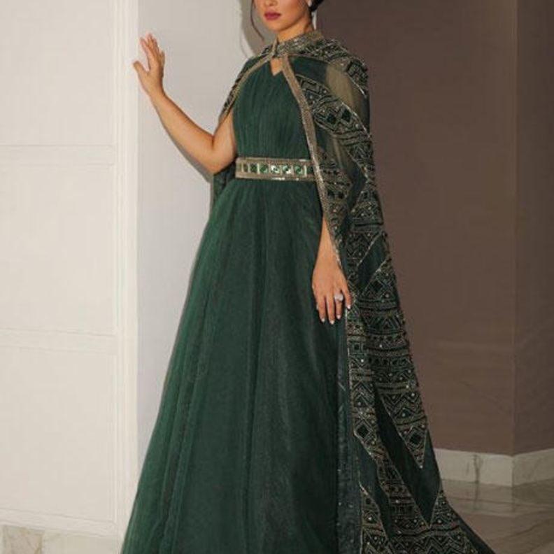  بلقيس بفستان باللون الاخضر