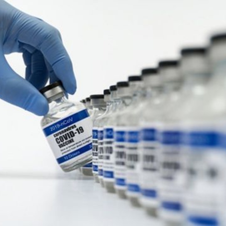 توزيع جرعات لقاح كوفيد-19