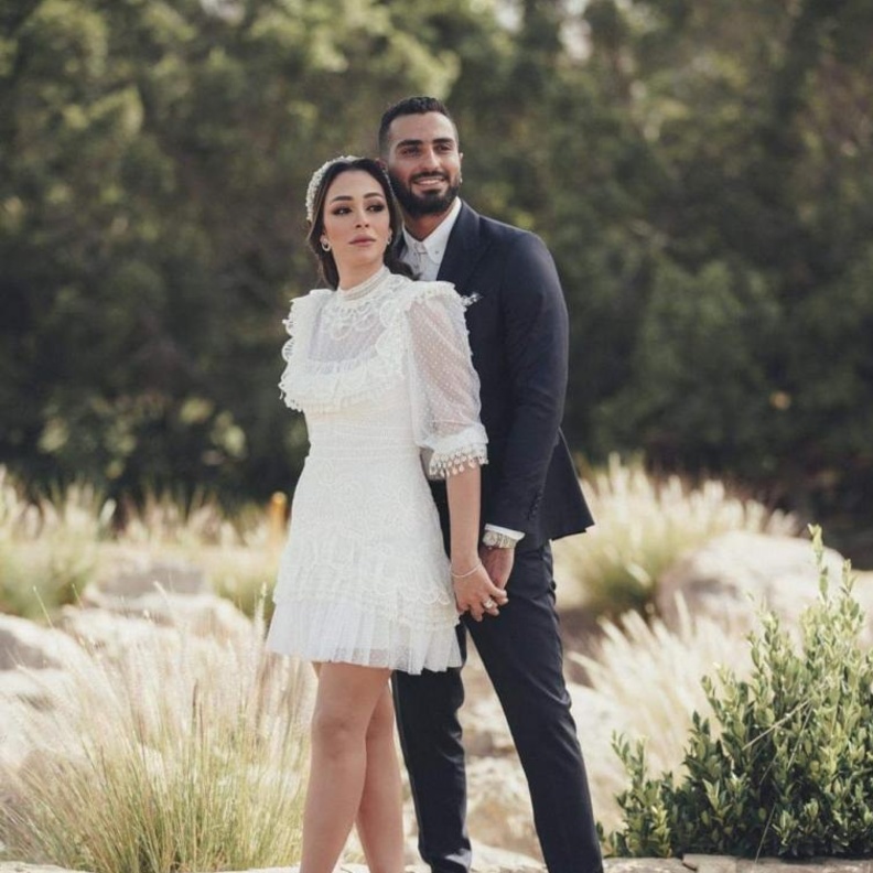  محمد الشرنوبي وراندا رياض اكتفيا بعقد القران