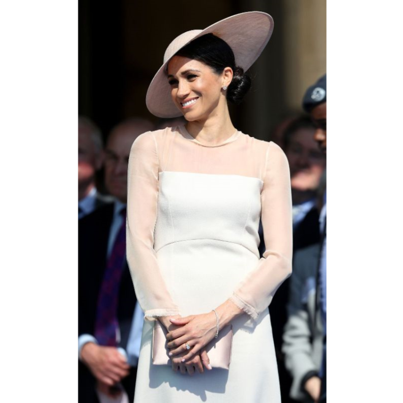 قبعة فيليب ترايسي ناسبت إطلالة ميغان تماماً
