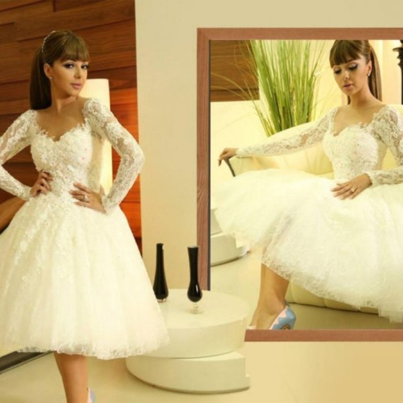 فستان زفاف مي عمر.