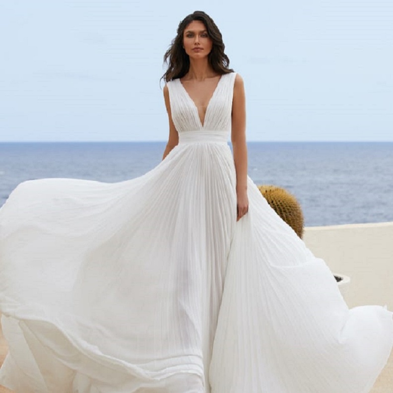  كيف تختار العروس فستان زفاف يخفي ترهلات البطن من pronovias