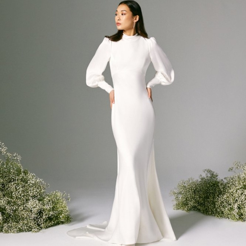 فستان زفاف بأكمام منفوخة من savannah miller