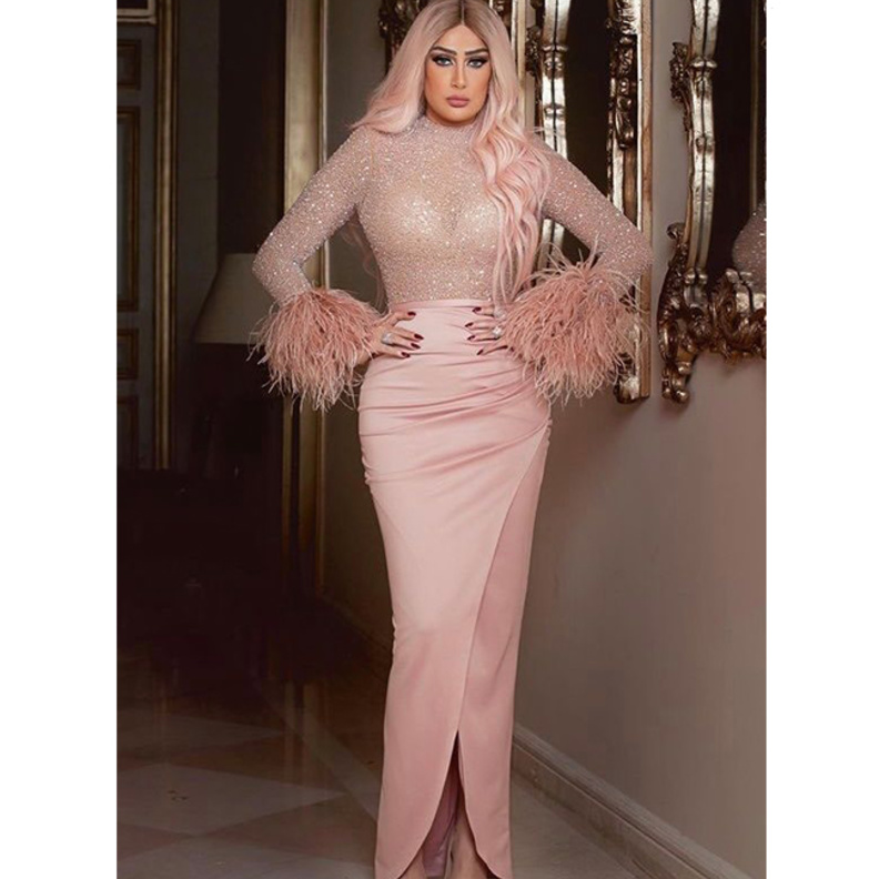 اطلالات غادة عبد الرازق بالفستان الزهري من توقيع المصمم يوسف الجسمي