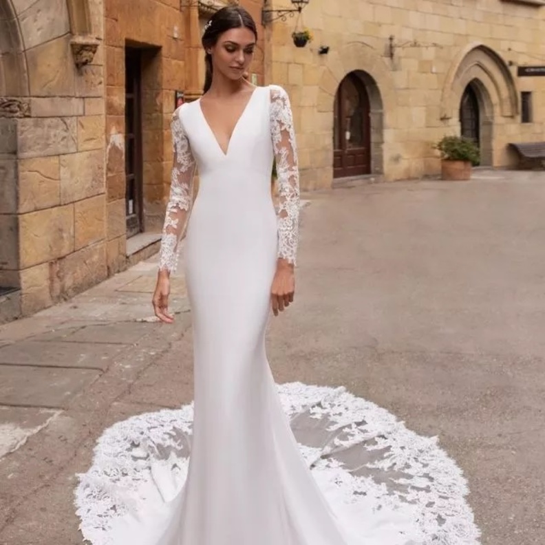 فساتين زفاف كم شفاف من pronovias