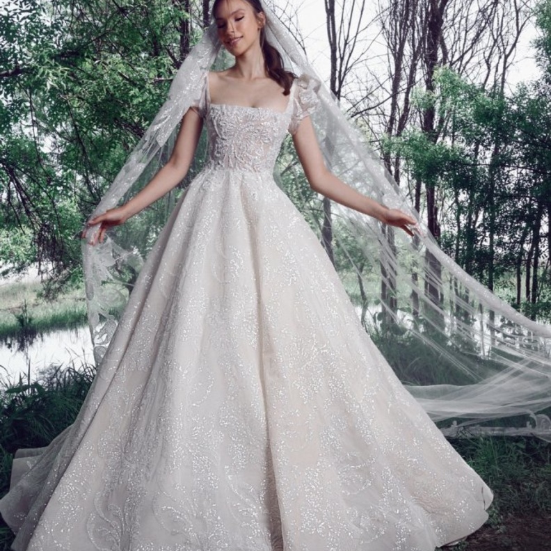 فساتين زفاف طوني ورد بقصة منفوشة