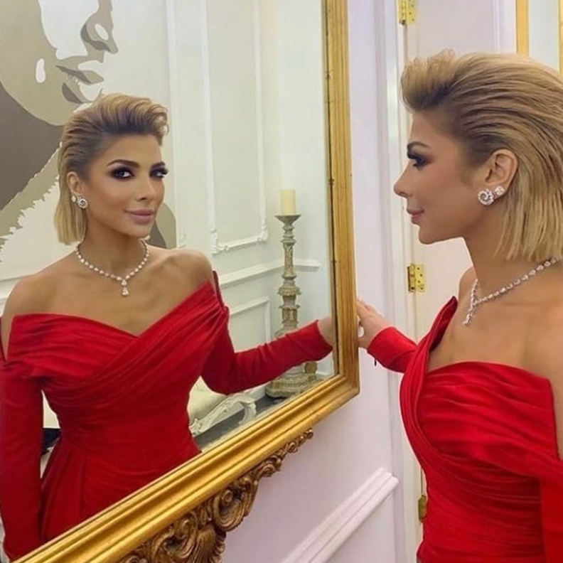 صور أحدث إطلالة للنجمة اصالة باللون الأحمر