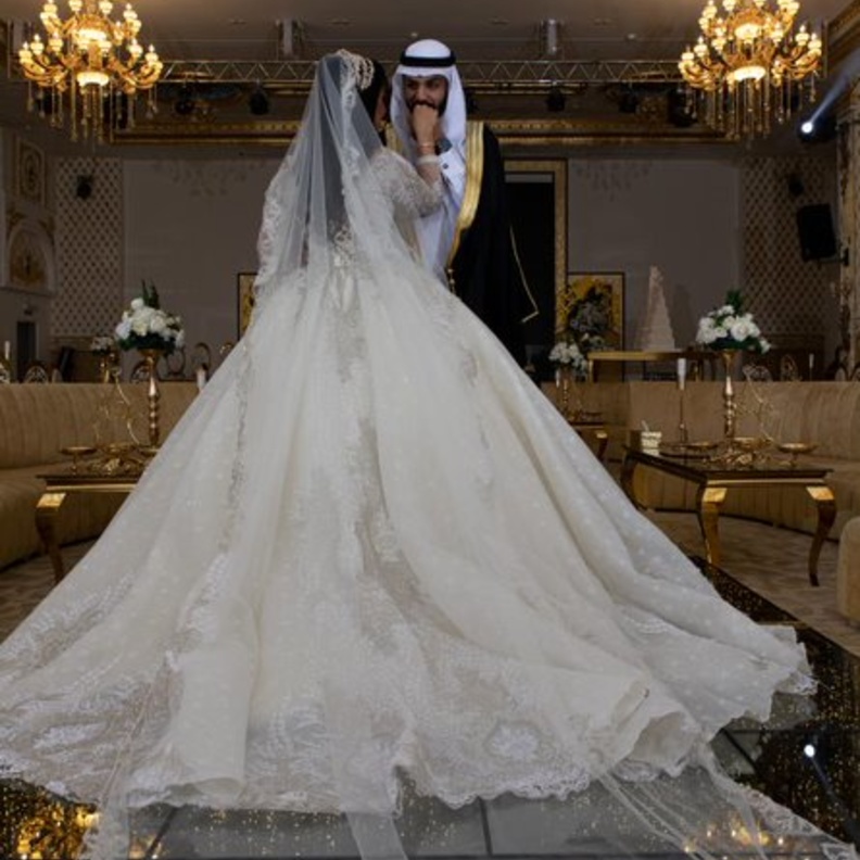 صورة لعروسين بكاميرا المصورة فاطمه السعيدي