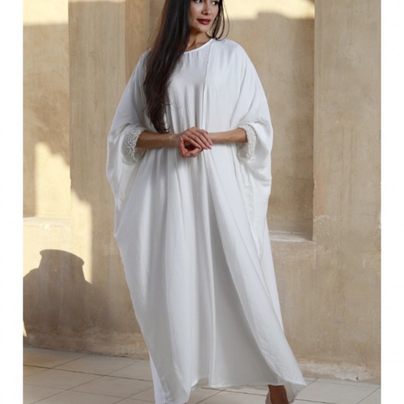 قصّّة المعطف الأنيقة بعباية صيفية جذابة من تصميم Asmalmarri