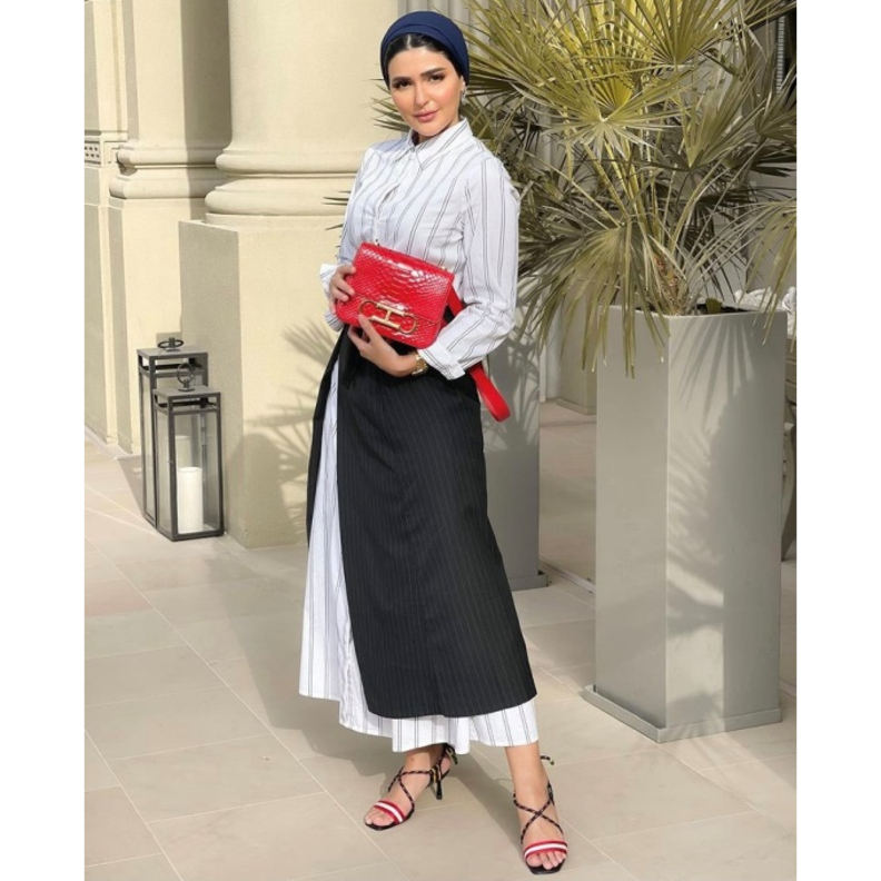 الخطوط العمودية ستعطيك إمتداداً وقواماً أطول بأسلوب حنين الصيفي