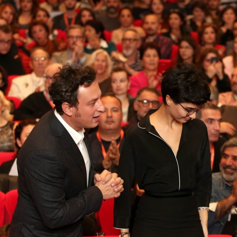 توبا بويوكستون وزوجها