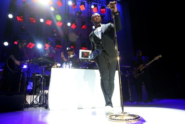 Singer-songwriter Usher performs on stage