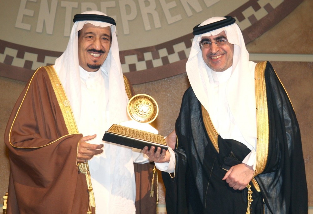 عزام الدخيل والملك سلمان