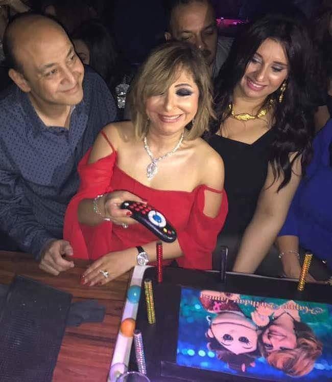 عمرو اديب ولميس الحديدي في ظهور سابق 